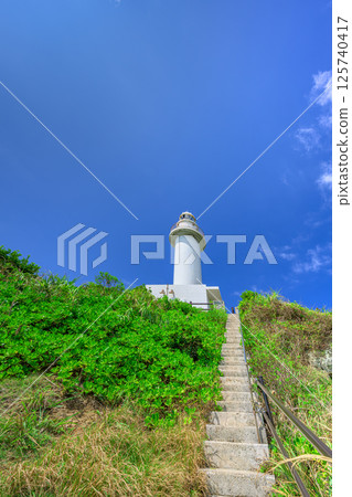 The beautiful contrast of blue and green at Okanzaki Lighthouse, Ishigaki Island 125740417