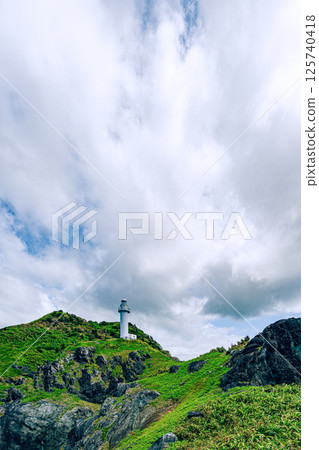 Dynamic scenery looking up at Okanzaki Lighthouse, Ishigaki Island 125740418