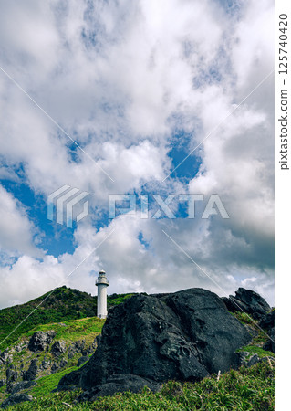 Okanzaki Lighthouse, nestled in the natural surroundings of Ishigaki Island - a spectacular tourist spot 125740420