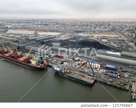 Aerial view of the port of Walvis Bay with the Namib Desert in the background 125740667