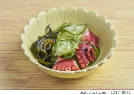 Octopus, cucumber and wakame seaweed in vinegar Octopus, cucumber and wakame seaweed in vinegar 125740672