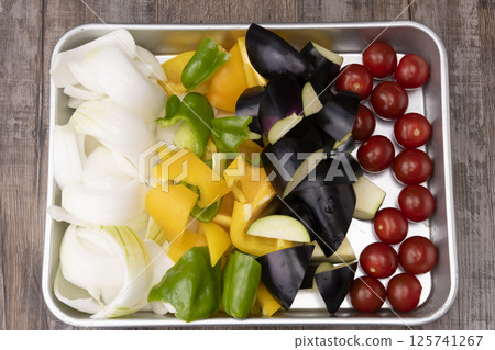 Cut summer vegetables Vegetable preparation Cut summer vegetables Vegetable preparation 125741267