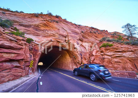 Car in Motion Through Sandstone Tunnel Zion National Park Road View Car in Motion Through Sandstone Tunnel Zion National Park Road View 125741963