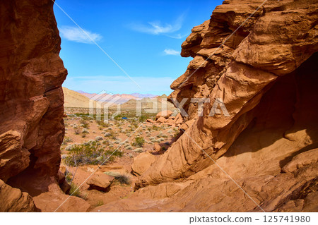 Red Rock Formations and Desert Valley at Golden Hour Perspective Red Rock Formations and Desert Valley at Golden Hour Perspective 125741980