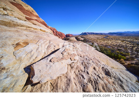 Red Rock Canyon Sandstone Boulders and Desert Vista Eye-Level View Red Rock Canyon Sandstone Boulders and Desert Vista Eye-Level View 125742023