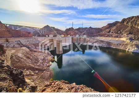 Hoover Dam and Memorial Bridge in Golden Desert Light Aerial 125742177