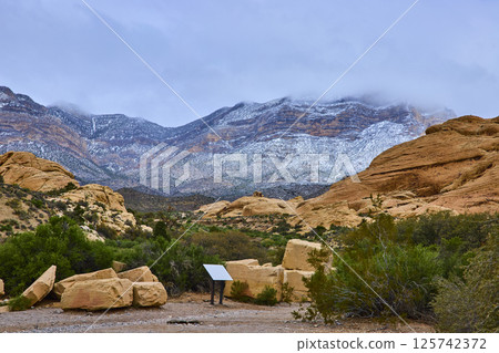 Red Rock Canyon Snowy Peaks and Sandstone Landscape Eye-Level View 125742372