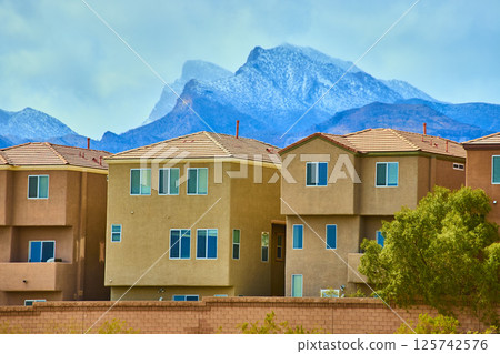 Modern Suburban Homes with Mountain Backdrop in Nevada Eye-Level View 125742576