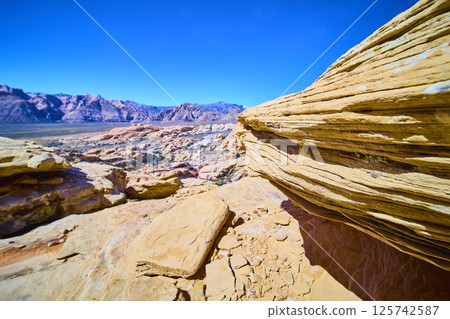 Red Rock Canyon Layered Formations and Mountains Aerial 125742587
