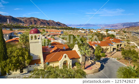 Aerial of Boulder City Chapel Overlooking Lake Mead and Desert Landscape 125742627