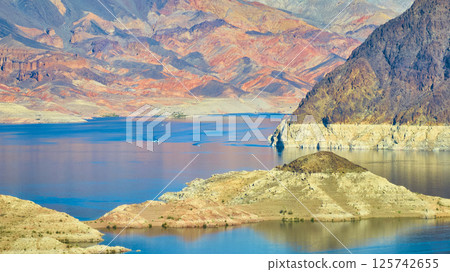 Aerial of Lake Mead's Blue Waters and Rugged Terrain Aerial of Lake Mead's Blue Waters and Rugged Terrain 125742655