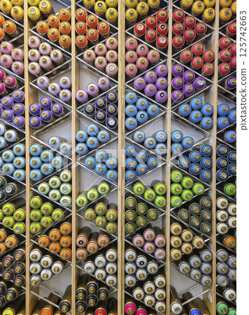 Colorful Spray Paint Display in Art Shop Aerial 125742663