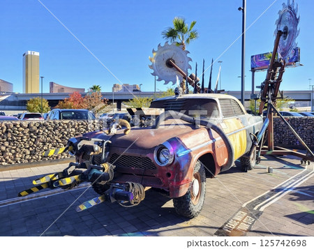 Post-Apocalyptic Car Display Against Las Vegas Skyline Eye-Level View 125742698