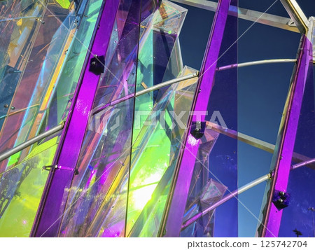 Vibrant Kaleidoscope Art Installation in Sunlight Eye-Level View Vibrant Kaleidoscope Art Installation in Sunlight Eye-Level View 125742704