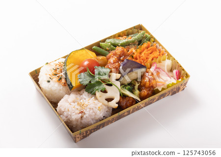 Young chicken with black vinegar sauce and colorful vegetables bento Young chicken with black vinegar sauce and colorful vegetables bento 125743056