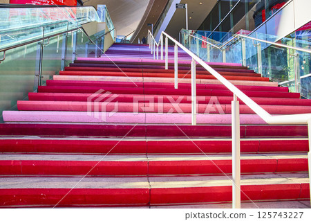 Vibrant Gradient Stairs in Urban Complex Upward Perspective Vibrant Gradient Stairs in Urban Complex Upward Perspective 125743227