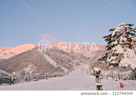 A beautiful ski resort illuminated by the morning sun 125744504