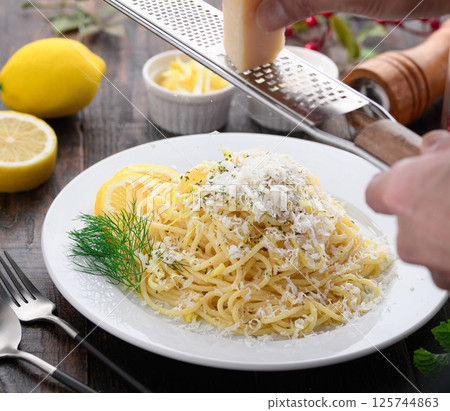 Lemon pasta with lots of cheese (Parmigiano Reggiano) Lemon pasta with lots of cheese (Parmigiano Reggiano) 125744863