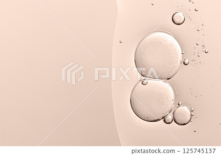 The texture of a cosmetic skin serum or body gel or moisturizer or shampoo. Copy space 125745137