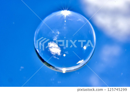 Ball floating in the blue sky 125745299