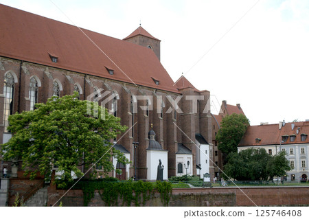 Ancient buildings on Ostrow Tumski at daytime in Wroclaw. High quality photo 125746408