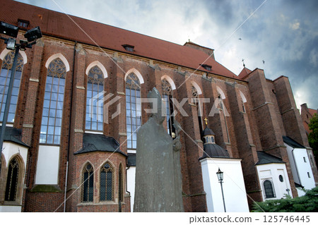 Ancient buildings on Ostrow Tumski at daytime in Wroclaw. High quality photo Ancient buildings on Ostrow Tumski at daytime in Wroclaw. High quality photo 125746445