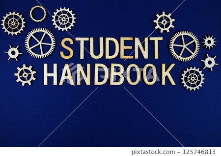 Student Handbook alphabet letters with gears element on navy blue background Student Handbook alphabet letters with gears element on navy blue background 125746813