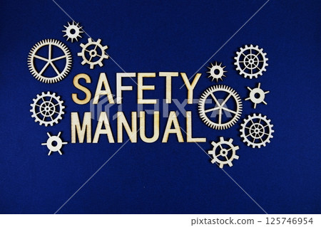 Safety Manual alphabet letters with gears element on navy blue background Safety Manual alphabet letters with gears element on navy blue background 125746954