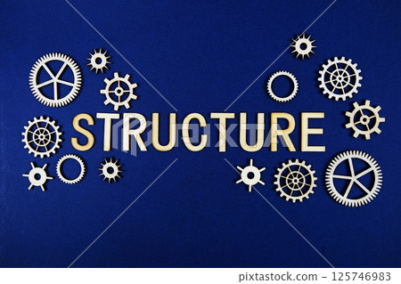Structure alphabet letters with gears element on navy blue background Structure alphabet letters with gears element on navy blue background 125746983