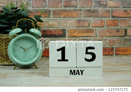 Wooden Calendar Showing the Date of May 15th. Day 15 of May month 125747275