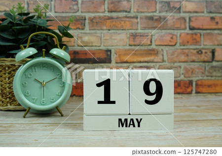 Wooden Calendar Showing the Date of May 19th. Day 19 of May month Wooden Calendar Showing the Date of May 19th. Day 19 of May month 125747280