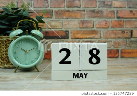 Wooden Calendar Showing the Date of May 28th. Day 28 of May month 125747289