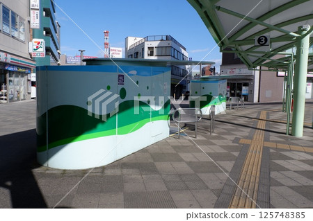 The entry and exit booths at the underground tower-style bicycle parking lot at the south exit of Hachioji Station 125748385