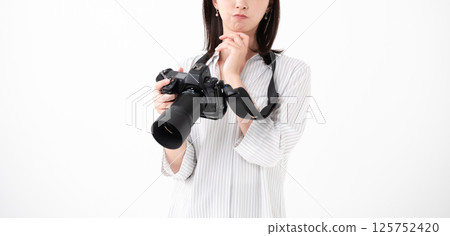 A woman taking a picture A woman taking a picture 125752420