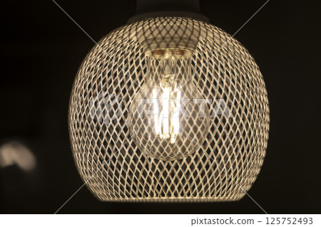 patterned light chandelier with light bulb 125752493