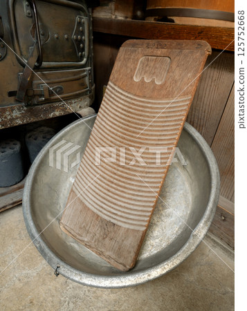 Washboard and metal basin Washboard and metal basin 125752668