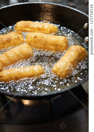 Fried cheese fingers, tequenos stuffed with white cheese 125756516