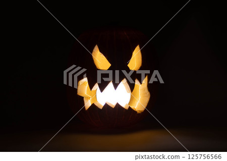 one halloween pumpkin backlit background one halloween pumpkin backlit background 125756566