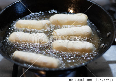 Fried cheese fingers, tequenos stuffed with white cheese Fried cheese fingers, tequenos stuffed with white cheese 125756644