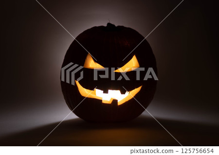 one halloween pumpkin backlit background 125756654