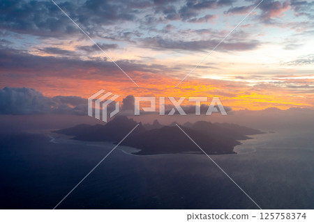 Aerial view of Moorea island at sunset, French Polynesia Aerial view of Moorea island at sunset, French Polynesia 125758374