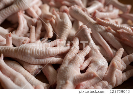 Raw chicken feet for cooking purpose 125759043