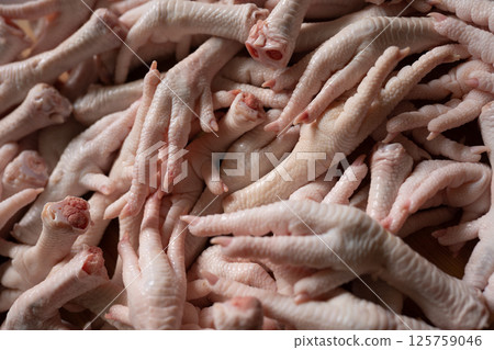 Raw chicken feet for cooking purpose 125759046