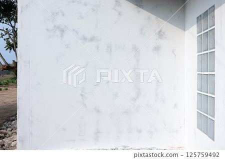 Building exterior with skim coat surface. 125759492