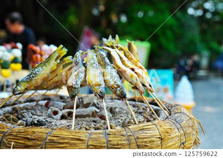 Salt-grilled sweetfish on a holiday Salt-grilled sweetfish on a holiday 125759622
