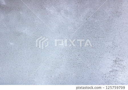 This is a closeup view of a textured surface made of gray granite 125759709