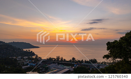Aerial view of a beautiful photo of a sunset over the ocean 125760340