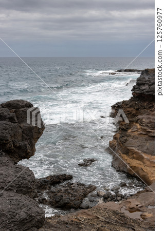 Rocky coast of Gran Canaria, Spain 125760977