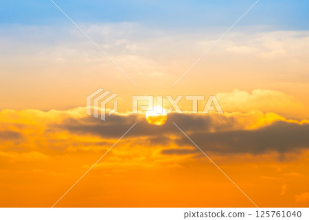 Sunset sky, sun and sunset clouds 125761040