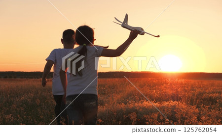 child airplane, children dream airplane pilot, child kid boy girl running with toy airplane across field, working team pilots, silhouette happy children running with toy airplanes hands, happy boy child airplane, children dream airplane pilot, child kid boy girl running with toy airplane across field, working team pilots, silhouette happy children running with toy airplanes hands, happy boy 125762054